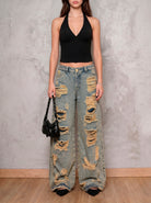 Jean azul wide leg Sulfur de DAVD en vista frontal, silueta amplia para mujer con acabado desgastado.