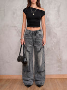 Jean gris claro Gray Spell de DAVD en vista frontal, silueta wide leg con costuras expuestas y acabado desgastado.