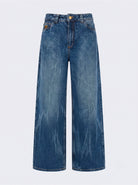 Jean índigo medio wide leg Indicum de DAVD en imagen de producto, silueta amplia en denim índigo medio.