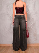 Jean negro wide leg Black Spell de DAVD en vista posterior, denim negro con caída amplia y bolsillos traseros.